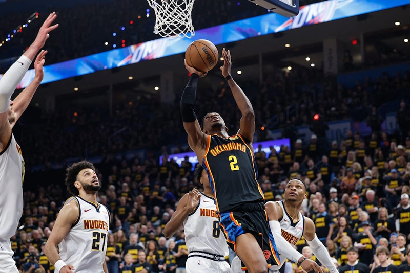 Oklahoma City Thunder guard Shai Gilgeous-Alexander (2) shoots against the Denver Nuggets in the second half during game two of the second round for the 2025 NBA Playoffs at Paycom Center. Mandatory Credit: Alonzo Adams-Imagn Images