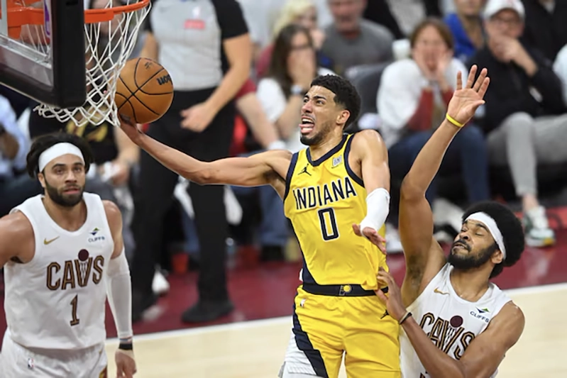 Tyrese Haliburton, Indiana Pacers, Cleveland Cavaliers, NBA Playoffs, Game Winner, Eastern Conference Semifinals, Donovan Mitchell, Rick Carlisle, Kenny Atkinson, Comeback Win, NBA Injuries, Evan Mobley, Darius Garland, De'Andre Hunter,