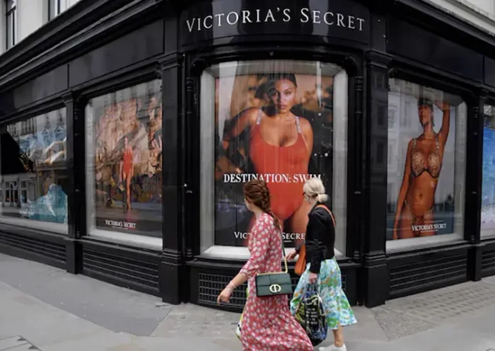 People pass a window display at a branch of Victoria's Secret in New Bond Street in London, Britain, March 31, 2021. REUTERS/Toby Melville/File Photo