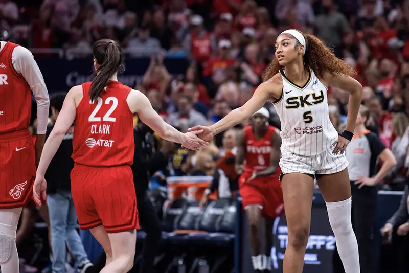 Indiana Fever guard Caitlin Clark (22) and Chicago Sky forward Angel Reese (5) shake hands before the game at Gainbridge Fieldhouse. Mandatory Credit: Trevor Ruszkowski-Imagn Images/File Photo