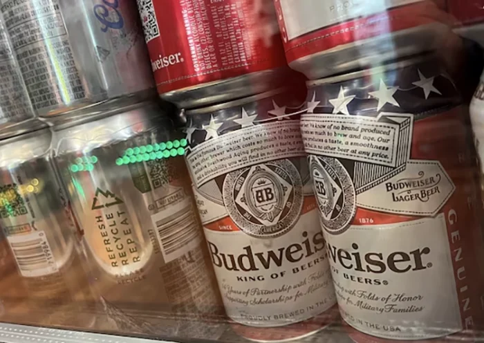 Cans of Budweiser brand beer are pictured at a liquor store in Washington, D.C. U.S., September 1, 2024. REUTERS/Daniel Becerril/File photo