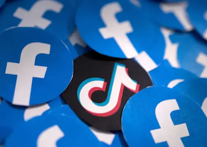 Printed Facebook and TikTok logos are seen in this illustration taken February 15, 2022. REUTERS/Dado Ruvic/Illustration/File Photo