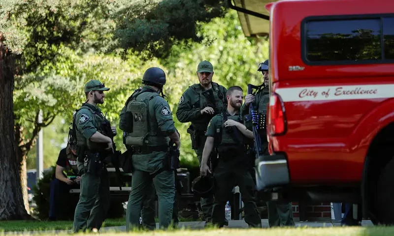 Law enforcement officers gather at Cherry Hill Park after multiple firefighters were attacked when responding to a fire in the Canfield Mountain area outside Coeur d’Alene, Idaho, U.S. June 29, 2025. REUTERS/Young Kwak