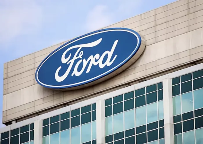 A Ford logo is seen on the Ford Motor World headquarters in Dearborn, Michigan, U.S., March 12, 2025. REUTERS/Rebecca Cook
