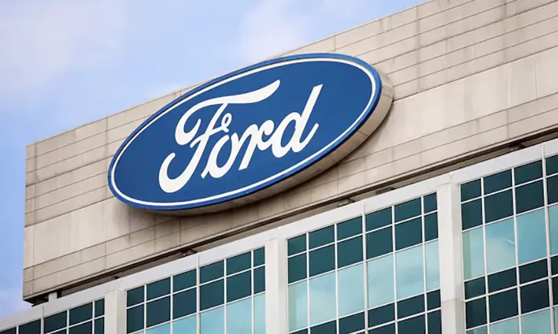 A Ford logo is seen on the Ford Motor World headquarters in Dearborn, Michigan, U.S., March 12, 2025. REUTERS/Rebecca Cook