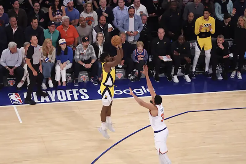 Indiana Pacers forward Jarace Walker (5) shoots against New York Knicks center Karl-Anthony Towns (32) in the fourth quarter during game five of the eastern conference finals for the 2025 NBA Playoffs at Madison Square Garden. Mandatory Credit: Brad Penner-Imagn Images