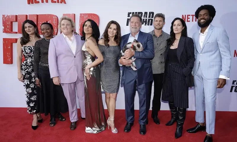 Cast members Arnold Schwarzenegger, Fabiana Udenio, Monica Barbaro, Barbara Eve Harris, Fortune Feimster, Aparna Brielle, Travis Van Winkle, Carrie-Anne Moss and Milan Carter attend a premiere for season 2 of the television series FUBAR in Los Angeles, California, U.S., June 11, 2025. REUTERS/Mario Anzuoni
