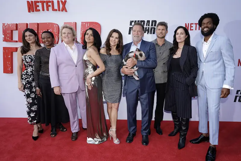Cast members Arnold Schwarzenegger, Fabiana Udenio, Monica Barbaro, Barbara Eve Harris, Fortune Feimster, Aparna Brielle, Travis Van Winkle, Carrie-Anne Moss and Milan Carter attend a premiere for season 2 of the television series FUBAR in Los Angeles, California, U.S., June 11, 2025. REUTERS/Mario Anzuoni