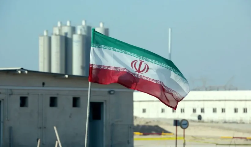 A picture taken on November 10, 2019, shows an Iranian flag in Iran's Bushehr nuclear power plant, during an official ceremony to kick-start works on a second reactor at the facility. - Bushehr is Iran's only nuclear power station and is currently running on imported fuel from Russia that is closely monitored by the UN's International Atomic Energy Agency. (Photo by ATTA KENARE / AFP) (Photo by ATTA KENARE/AFP via Getty Images)