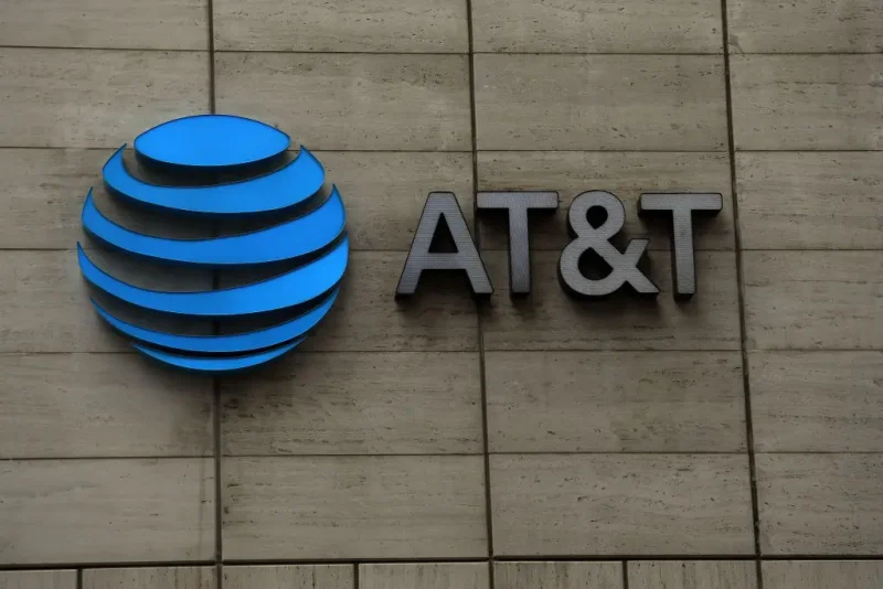 DALLAS, TEXAS - MARCH 13: The logo of AT&T outside of AT&T corporate headquarters on March 13, 2020 in Dallas, Texas. AT&T is allowing employees to work remotely from home if they have the ability to do so, as a safety measure due to COVID-19. (Photo by Ronald Martinez/Getty Images)