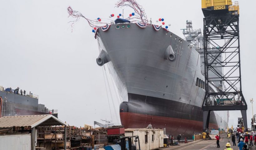 USNS Harvey Milk departs the General Dynamics NASSCO shipyard after a ceremonial address in San Diego, California on November 6, 2021. - One of the first openly gay politicians in the United States, who was assassinated four decades ago, will have a ship named after him this weekend, as the US military looks to keep step with modern-day social attitudes. The USNS Harvey Milk honours a former navy diver who served at a time there was a ban on homosexuality in the armed forces, and who was later shot dead in San Francisco, months after winning public office. (Photo by ARIANA DREHSLER / AFP) (Photo by ARIANA DREHSLER/AFP via Getty Images)