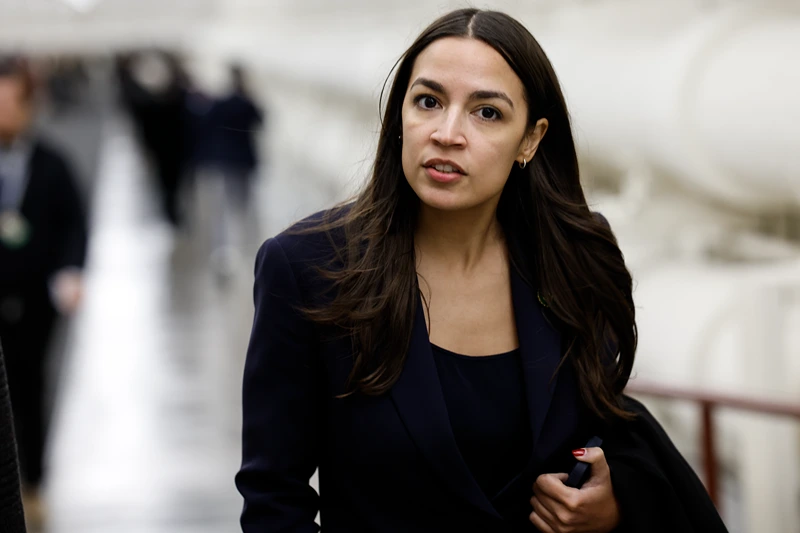 WASHINGTON, DC - NOVEMBER 14: U.S. Rep. Alexandria Ocasio-Cortez (D-NY) walks to the House Chambers of the U.S. Capitol Building on November 14, 2023 in Washington, DC. The House of Representatives voted on a series of bills including an interim spending bill it passed to fund the government, which will now go to the Senate for consideration. (Photo by Anna Moneymaker/Getty Images)