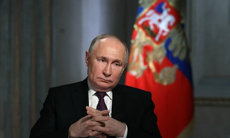 TOPSHOT - In this pool photograph distributed by Russia's state agency Sputnik, Russian President Vladimir Putin gives an interview to TV host and Director General of Rossiya Segodnya (RIA Novosti) news agency Dmitry Kiselyov (not pictured) at the Kremlin in Moscow on March 12, 2024. (Photo by Gavriil GRIGOROV / POOL / AFP) (Photo by GAVRIIL GRIGOROV/POOL/AFP via Getty Images)