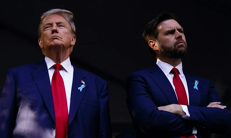 Former US President and Republican presidential candidate Donald Trump (L) and US Senator from Ohio and Republican vice presidential candidate J.D. Vance attend a remembrance ceremony on the 23rd anniversary of the September 11 terror attack on the World Trade Center at Ground Zero, in New York City on September 11, 2024. (Photo by Adam GRAY / AFP) (Photo by ADAM GRAY/AFP via Getty Images)