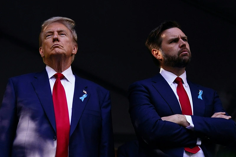 Former US President and Republican presidential candidate Donald Trump (L) and US Senator from Ohio and Republican vice presidential candidate J.D. Vance attend a remembrance ceremony on the 23rd anniversary of the September 11 terror attack on the World Trade Center at Ground Zero, in New York City on September 11, 2024. (Photo by Adam GRAY / AFP) (Photo by ADAM GRAY/AFP via Getty Images)