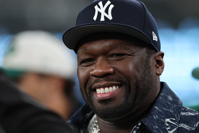 EAST RUTHERFORD, NEW JERSEY - OCTOBER 14: Rapper 50 Cent is seen on the sidelines prior to the game between the Buffalo Bills and the New York Jets at MetLife Stadium on October 14, 2024 in East Rutherford, New Jersey. (Photo by Elsa/Getty Images)
