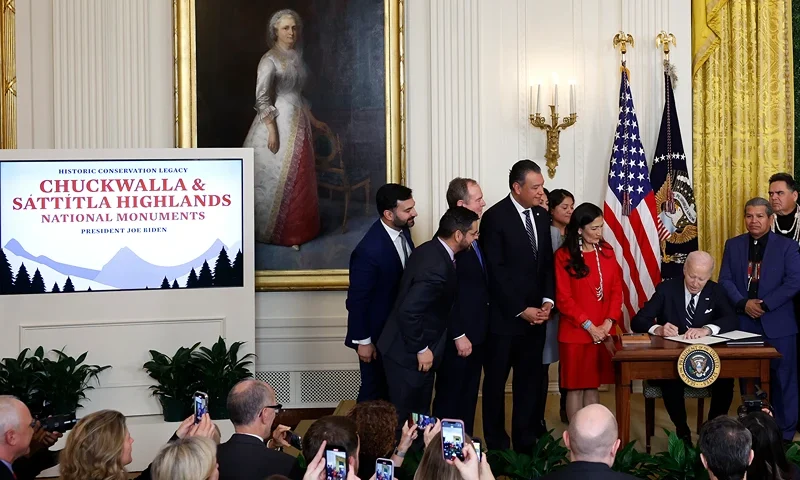U.S. President Joe Biden signs proclamations creating the Chuckwalla National Monument and the Sáttítla Highlands National Monument in the East Room at the White House an on January 14, 2025 in Washington, DC. The designations will protect more than 848,000 acres of land in California, adding to Biden's legacy of setting aside more than 674 million acres of federal land. Biden was joined by Interior Secretary Deb Haaland and other lawmakers and native leaders. (Photo by Kevin Dietsch/Getty Images)