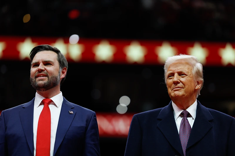 WASHINGTON, DC - JANUARY 20: U.S. Vice President J.D. Vance and U.S. President Donald Trump watch during an indoor inauguration parade at the Capital One Arena on January 20, 2025 in Washington, DC. Donald Trump takes office for his second term as the 47th president of the United States. (Photo by Anna Moneymaker/Getty Images)