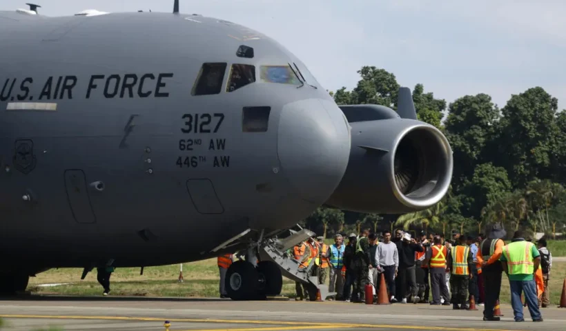 SAN PEDRO SULA, HONDURAS - JANUARY 31: US Air force flight carrying deported migrants by the US government arrive at Ramon Villeda Morales International Airport on January 31, 2025 in San Pedro Sula, Honduras. Honduras receives 126 migrants in two different flights as part of mass deportation plans by the Trump's administration. People were captured once they got into the US or during the raids conducted by the authorities. (Photo by Jorge Salvador Cabrera/Getty Images)