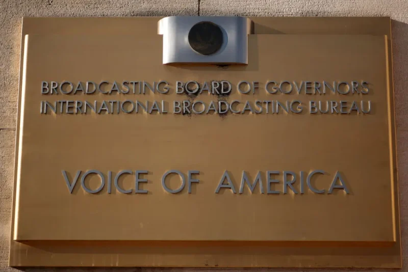 WASHINGTON, DC - MARCH 17: The Voice of America (VOA) sign is displayed on its building on March 17, 2025 in Washington, DC. President Donald Trump signed an executive order to eliminate the U.S. Agency for Global Media (USAGM), the parent agency of VOA, and put VOA employees on administrative leave. (Photo by Alex Wong/Getty Images)