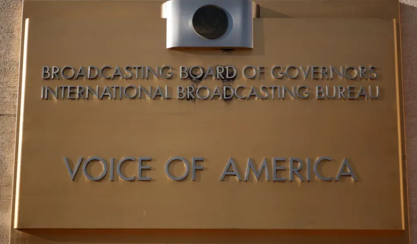 WASHINGTON, DC - MARCH 17: The Voice of America (VOA) sign is displayed on its building on March 17, 2025 in Washington, DC. President Donald Trump signed an executive order to eliminate the U.S. Agency for Global Media (USAGM), the parent agency of VOA, and put VOA employees on administrative leave. (Photo by Alex Wong/Getty Images)