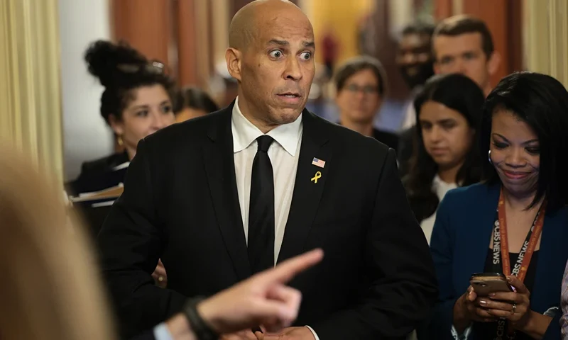 WASHINGTON, DC - APRIL 01: U.S. Sen. Cory Booker (D-NJ) speaks to reporters as he leaves the Senate Chamber after delivering a record setting floor speech at the U.S. Capitol on April 01, 2025 in Washington, DC. Booker spoke on the Senate floor for more than 25 hours protesting President Trump’s agenda, breaking a record set by Sen. Strom Thurmond's 24 hour, 18 minute filibuster against the Civil Rights Act in 1957. (Photo by Win McNamee/Getty Images)