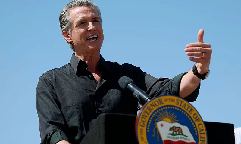 CERES, CALIFORNIA - APRIL 16: California Governor Gavin Newsom speaks during a news conference at Gemperle Orchard on April 16, 2025 in Ceres, California. Governor Gavin Newsom and California Attorney General Rob Bonta have filed a lawsuit in federal court challenging the Trump administration's use of emergency powers to enact sweeping tariffs that hurt states, consumers, and businesses. The tariffs have disrupted supply chains, increased costs for the state and Californians, and inflicted billions in damages on California’s economy, the fifth largest in the world. (Photo by Justin Sullivan/Getty Images)