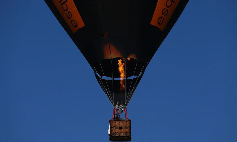 A hot air balloon is pictured during the 35th Hot Air Balloon International Festival, in Torres, Brazil, on May 03, 2025. (Photo by SILVIO AVILA / AFP) (Photo by SILVIO AVILA/AFP via Getty Images)
