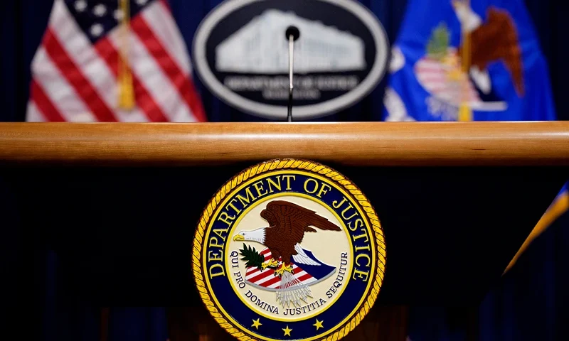 WASHINGTON, DC - MAY 6: The Department of Justice seal and logo are displayed before U.S. Attorney General Pam Bondi arrives for a news conference at the Department of Justice on May 6, 2025 in Washington, DC. The Justice Department along with the Drug Enforcement Administration (DEA) and the U.S. Attorney's Office for the District of New Mexico are set to announce that they have completed an operation targeting a large drug trafficking organization that has been dealing fentanyl and other illicit narcotics. (Photo by Andrew Harnik/Getty Images)