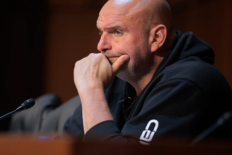 WASHINGTON, DC - MAY 08: Sen. John Fetterman (D-PA) questions tech leaders in artificial intelligence during a hearing of the Senate Committee on Commerce, Science, and Transportation in the Hart Senate Office Building on Capitol Hill on May 08, 2025 in Washington, DC. Tech leaders from OpenAI, Microsoft, Advanced Micro Devices (AMD) and CoreWeave testified about the global artificial intelligence race and how the United States can remain competitive. (Photo by Chip Somodevilla/Getty Images)