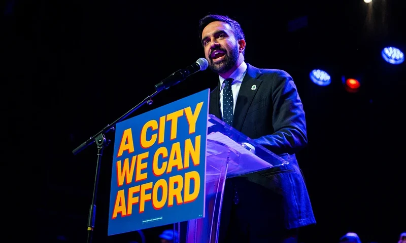 Zohran Mamdani speaks enthusiastically into the microphone at a rally at Brooklyn Steel in Brooklyn New York on May 4 2025. (Photo by Madison Swart / Hans Lucas / Hans Lucas via AFP) (Photo by MADISON SWART/Hans Lucas/AFP via Getty Images)