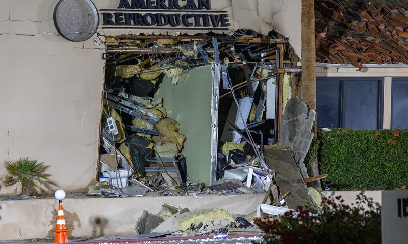The damaged front of the American Reproductive Centers fertility clinic stands following a bomb blast on May 17, 2025 in Palm Springs, California. A suspected bomber is believed to have post a manifesto to social media before the explosion. One person was confirmed dead at the scene, according to police. (Photo by David McNew/Getty Images)