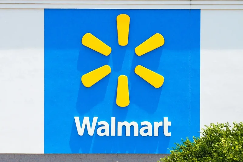 AUSTIN, TEXAS - MAY 15: In an aerial view, the logo of a Walmart Supercenter is seen on May 15, 2025 in Austin, Texas. Walmart surpassed first-quarter earnings estimate, while falling short of quarterly sales. Chief Financial Officer John David Rainey has said that consumers could begin to see price hikes as early as later this month due to the various newly enacted Trump administration tariffs. (Photo by Brandon Bell/Getty Images)