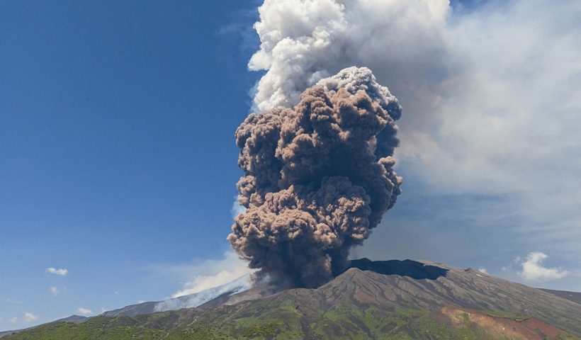 TOPSHOT - Smoke rises from the crater of the Etna volcano as it erupts, on Mount Etna near Catania on June 2, 2025. A huge plume of ash, gas and rock spewed forth on June 2, 2025, from Italy's Mount Etna, Europe's largest active volcano, after a portion of its southeastern crater likely collapsed, authorities said. (Photo by Giuseppe Distefano / AFP) (Photo by GIUSEPPE DISTEFANO/AFP via Getty Images)