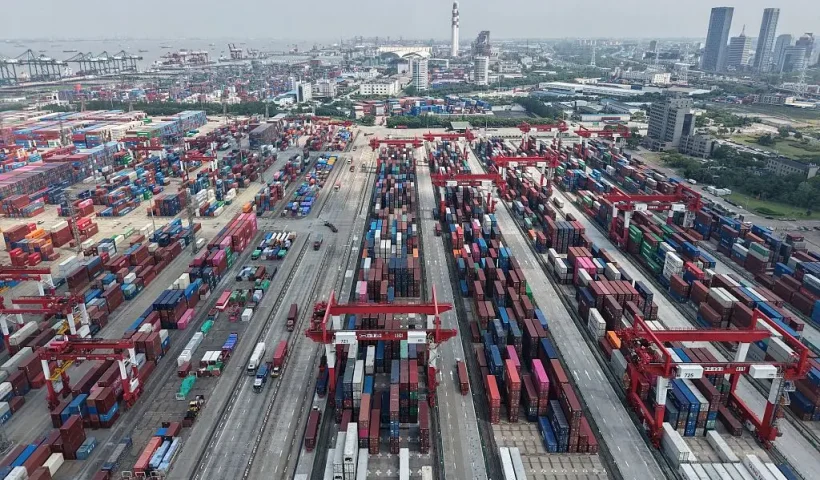 Shipping containers are stacked at a port in Shanghai on June 9, 2025. Chinese exports grew slower than expected in May, according to official data on June 9, as shipments to the United States tumbled amid global trade turmoil triggered by Donald Trump's tariff blitz. (Photo by AFP) / China OUT (Photo by -/AFP via Getty Images)