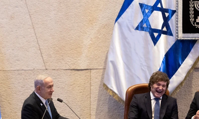 JERUSALEM - JUNE 11: Israeli Prime Minister, Benjamin Netanyahu, greets Argentinian President Javier Milei as he attends a special address to the Israeli Knesset on June 11, 2025 in Jerusalem. (Photo by Amir Levy/Getty Images)