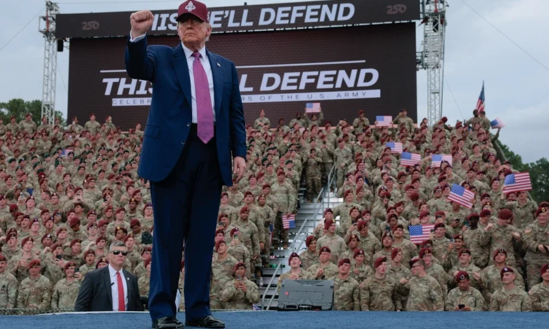 FORT BRAGG, NORTH CAROLINA - JUNE 10: U.S. President Donald Trump pumps his fist as he leaves the stage during a rally with U.S. Army troops on June 10, 2025 at Fort Bragg, North Carolina. Trump is traveling to Fort Bragg Army base to observe a military demonstration and give remarks in honor of the U.S. Army’s 250th anniversary. (Photo by Anna Moneymaker/Getty Images)