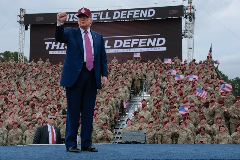 FORT BRAGG, NORTH CAROLINA - JUNE 10: U.S. President Donald Trump pumps his fist as he leaves the stage during a rally with U.S. Army troops on June 10, 2025 at Fort Bragg, North Carolina. Trump is traveling to Fort Bragg Army base to observe a military demonstration and give remarks in honor of the U.S. Army’s 250th anniversary. (Photo by Anna Moneymaker/Getty Images)