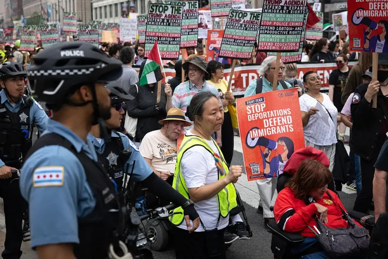 CHICAGO, ILLINOIS - JUNE 12: Hundreds of immigrant rights protestors march through the Loop on June 12, 2025 in Chicago, Illinois. The protest is one of many taking place across the country as the Trump administration pushes to increase apprehensions of immigrants. (Photo by Scott Olson/Getty Images)