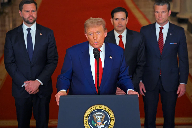 US President Donald Trump addresses the nation, alongside US Vice President JD Vance (L), US Secretary of State Marco Rubio (2nd R) and US Secretary of Defense Pete Hegseth (R), from the White House in Washington, DC on June 21, 2025, following the announcement that the US bombed nuclear sites in Iran. President Donald Trump said June 21, 2025 the US military has carried out a "very successful attack" on three Iranian nuclear sites, including the underground uranium enrichment facility at Fordo. "We have completed our very successful attack on the three Nuclear sites in Iran, including Fordow, Natanz, and Esfahan," Trump said in a post on his Truth Social platform. (Photo by Carlos Barria / POOL / AFP) (Photo by CARLOS BARRIA/POOL/AFP via Getty Images)