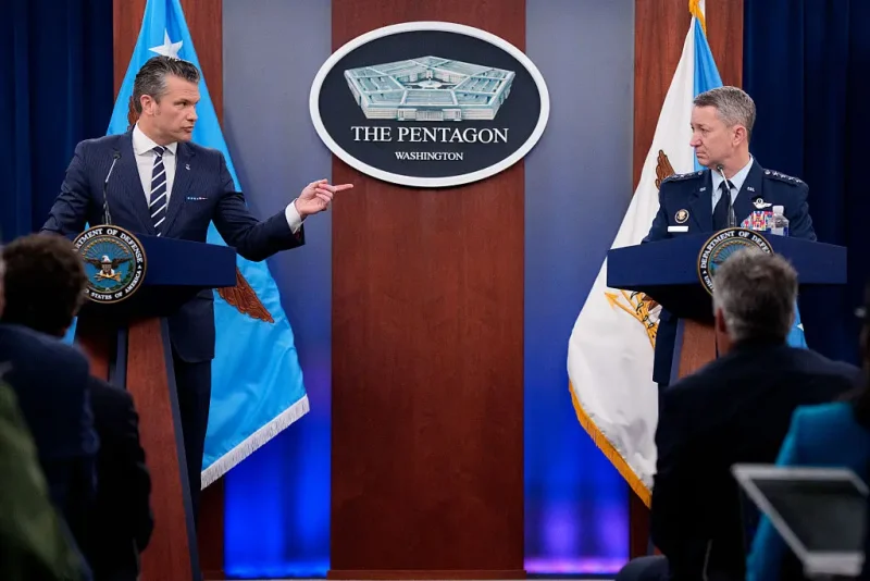 ARLINGTON, VIRGINIA - JUNE 22: U.S. Defense Secretary Pete Hegseth (L), accompanied by Chairman of the Joint Chiefs of Staff Air Force Gen. Dan Caine (R), speaks during a news conference at the Pentagon on June 22, 2025 in Arlington, Virginia. U.S. President Donald Trump gave an address to the nation last night after three Iranian nuclear facilities were struck by the U.S. military. (Photo by Andrew Harnik/Getty Images)
