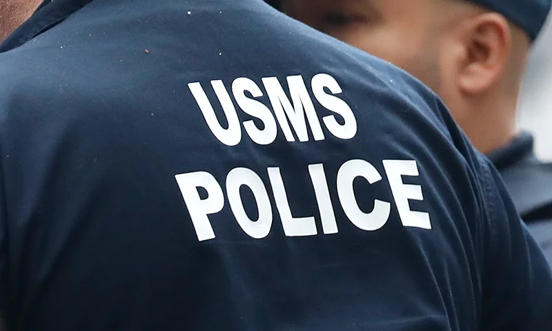 A U.S. Marshals Service Police officer is seen outside the federal courthouse ahead of the Sean Combs trial in lower Manhattan on June 18, 2025 in New York City. The prosecutors in the Sean Diddy Combs sex trafficking and racketeering federal trial are expected to rest their case at the end of the week. Earlier, the defense pushed for a mistrial as it was discovered that a juror provided misleading information. Combs faces life in prison if convicted on all charges which also include threats, violence and drug fueled “freak offs” sex parties. (Photo by John Lamparski/Getty Images)