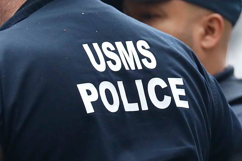 A U.S. Marshals Service Police officer is seen outside the federal courthouse ahead of the Sean Combs trial in lower Manhattan on June 18, 2025 in New York City. The prosecutors in the Sean Diddy Combs sex trafficking and racketeering federal trial are expected to rest their case at the end of the week. Earlier, the defense pushed for a mistrial as it was discovered that a juror provided misleading information. Combs faces life in prison if convicted on all charges which also include threats, violence and drug fueled “freak offs” sex parties. (Photo by John Lamparski/Getty Images)