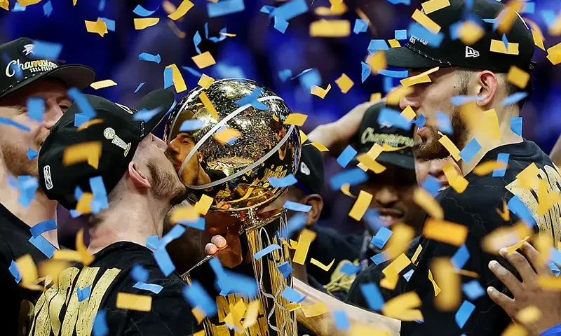 Alex Caruso #9 of the Oklahoma City Thunder celebrates with the Larry O'Brien Championship Trophy after defeating the Indiana Pacers 103-91 in Game Seven of the 2025 NBA Finals at Paycom Center on June 22, 2025 in Oklahoma City, Oklahoma. (Photo by Matthew Stockman/Getty Images)