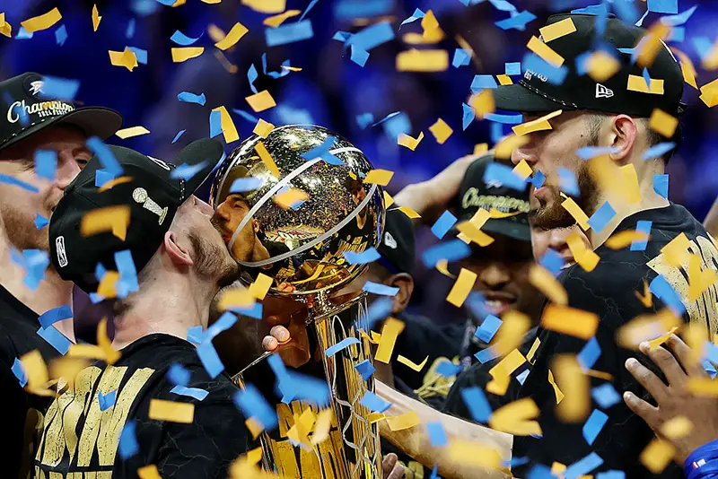 Alex Caruso #9 of the Oklahoma City Thunder celebrates with the Larry O'Brien Championship Trophy after defeating the Indiana Pacers 103-91 in Game Seven of the 2025 NBA Finals at Paycom Center on June 22, 2025 in Oklahoma City, Oklahoma. (Photo by Matthew Stockman/Getty Images)