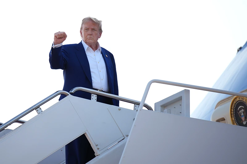 JOINT BASE ANDREWS, MARYLAND - JUNE 24: U.S. President Donald Trump boards Air Force One to depart for the 2025 NATO Summit on June 24, 2025 at Joint Base Andrews, Maryland. This year's NATO summit, which brings together heads of state and government from across the military alliance, is being held in the Netherlands for the first time. Among other matters, members are to approve a new defense investment plan that raises the target for defense spending to 5% of GDP. (Photo by Andrew Harnik/Getty Images)
