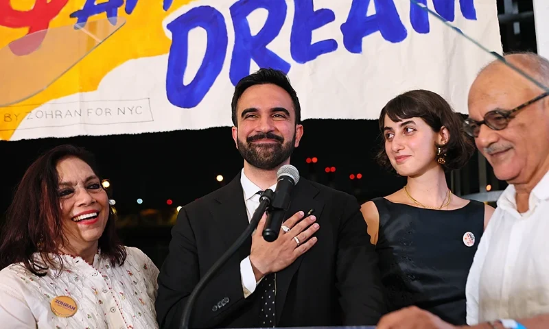 NEW YORK, NEW YORK - JUNE 24: (L-R) Mira Nair, New York mayoral candidate, State Rep. Zohran Mamdani (D-NY) Rama Duwaji and Mahmood Mamdani celebrate on stage during an election night gathering at The Greats of Craft LIC on June 24, 2025 in the Long Island City neighborhood of the Queens borough in New York City. (Photo by Michael M. Santiago/Getty Images)