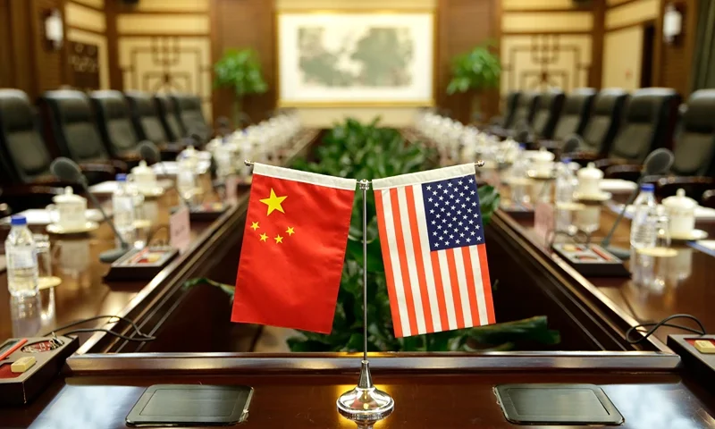 Flags of the US and China are placed ahead of a meeting between US Secretary of Agriculture Sonny Perdue and China's Agriculture Minister Han Changfu at the Ministry of Agriculture in Beijing on June 30, 2017. China opened its gates to US beef imports last week, giving US cattle farmers much sought-after access to the country's massive market following a 14-year ban. / AFP PHOTO / POOL / JASON LEE (Photo credit should read JASON LEE/AFP via Getty Images)