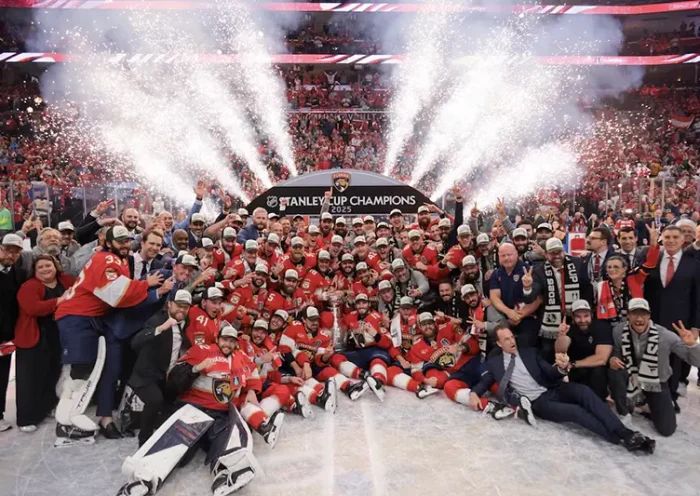 The Florida Panthers pose for a photo with the Stanley Cup after winning game six of the 2025 Stanley Cup Final against the Edmonton Oilers at Amerant Bank Arena. Mandatory Credit: Sam Navarro-Imagn Images