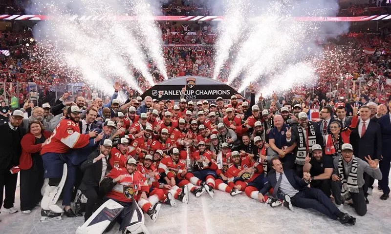 The Florida Panthers pose for a photo with the Stanley Cup after winning game six of the 2025 Stanley Cup Final against the Edmonton Oilers at Amerant Bank Arena. Mandatory Credit: Sam Navarro-Imagn Images